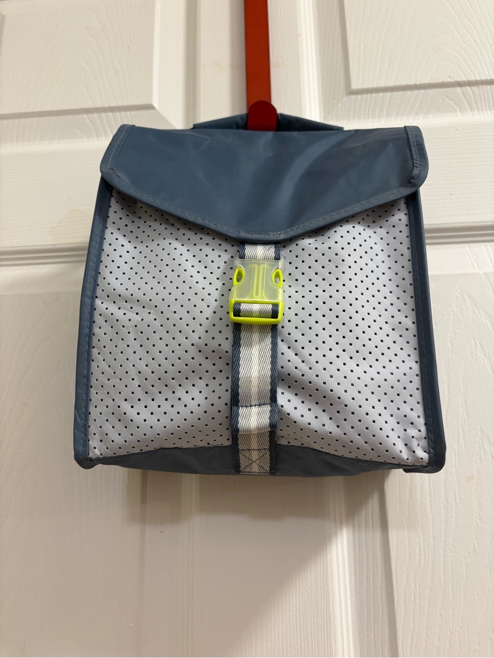Thirty-One Gifts fold-over insulated lunch bag in a soft blue colorblock pattern